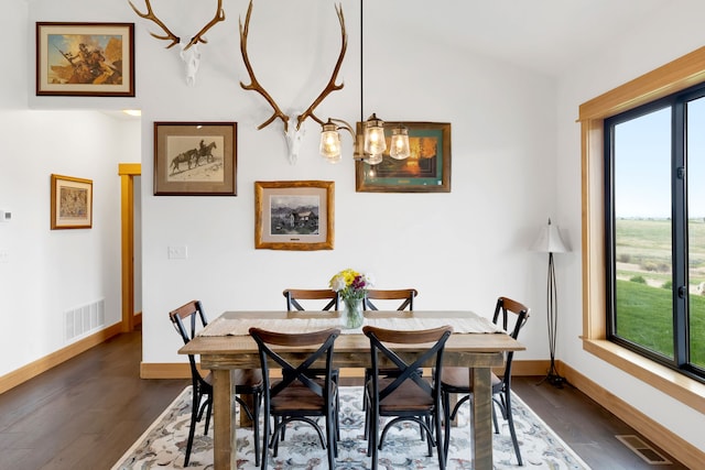 559 Stage Springs Ln, Stevensville, MT 59870 - dining area with dark wood finished floors and baseboards