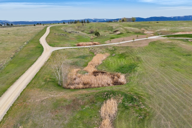 559 Stage Springs Ln, Stevensville, MT 59870 - aerial overview of property's location featuring rural landscape and a mountain backdrop