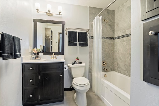 bathroom with shower / bath combo with shower curtain, toilet, and vanity