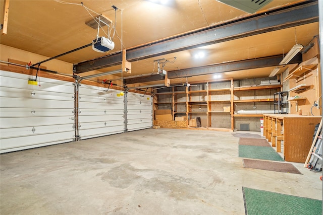 garage featuring a garage door opener