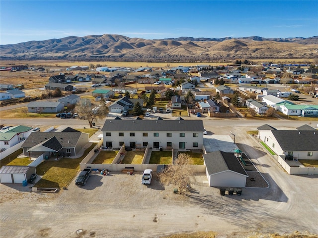 aerial view of residential area with mountains