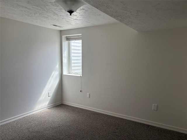 307 S Iowa St, Conrad, MT 59425 - empty room with carpet, a textured ceiling, and baseboards