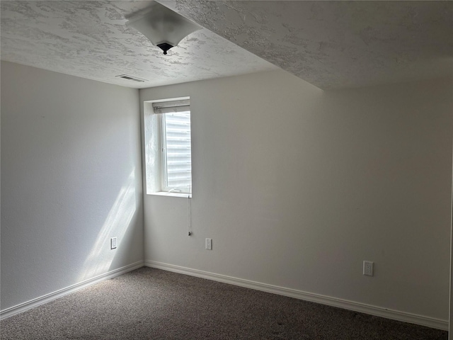 307 S Iowa St, Conrad, MT 59425 - carpeted spare room with a textured ceiling and baseboards