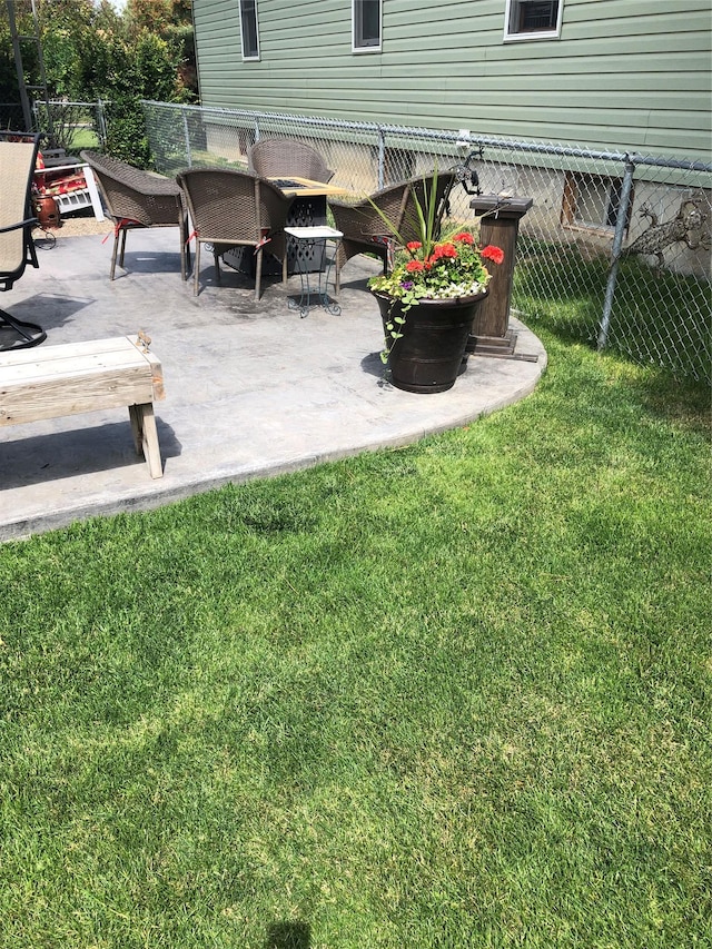 307 S Iowa St, Conrad, MT 59425 - view of yard featuring outdoor dining space and a patio area