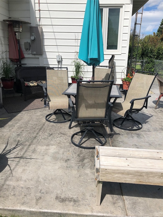 307 S Iowa St, Conrad, MT 59425 - view of patio featuring outdoor dining space and fence