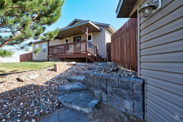 1004 Pintail Ct, Helena, MT 59602 - view of front of house with stairs and a porch
