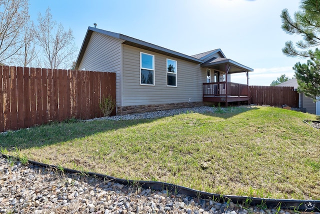 rear view of house with a deck