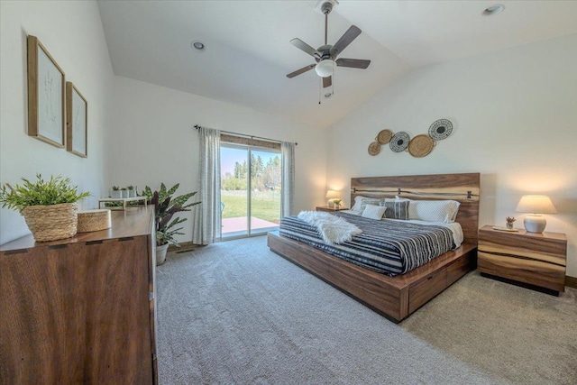 carpeted bedroom featuring vaulted ceiling, access to exterior, and ceiling fan