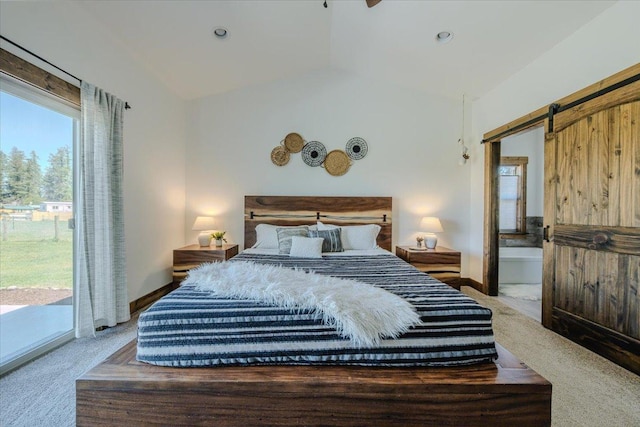 bedroom with carpet, vaulted ceiling, access to outside, and a barn door