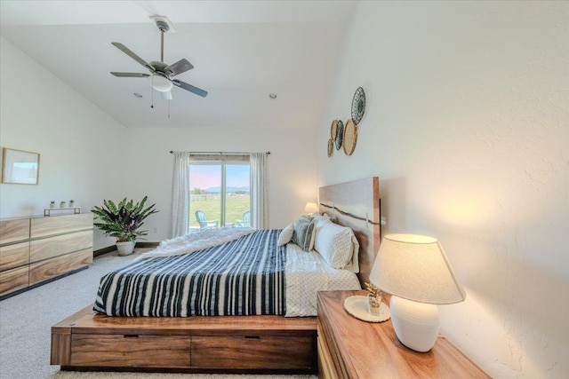 carpeted bedroom with high vaulted ceiling, ceiling fan, and baseboards