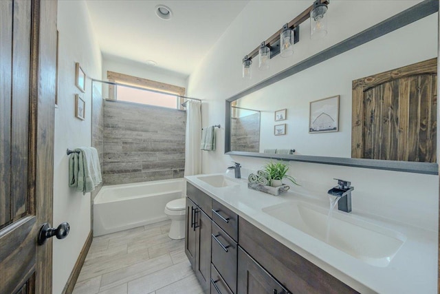 full bathroom featuring toilet, shower / bath combo, and double vanity