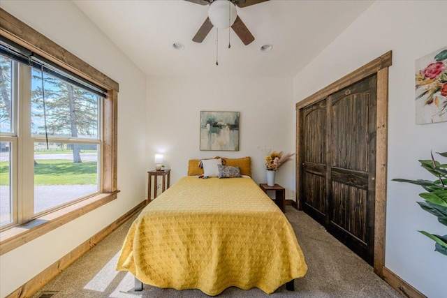 carpeted bedroom with baseboards, a closet, a ceiling fan, and recessed lighting