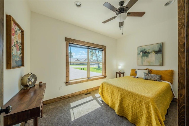 bedroom featuring carpet flooring, baseboards, and ceiling fan