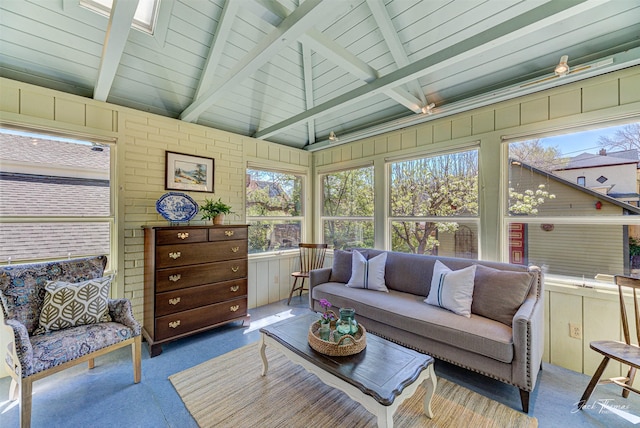 sunroom featuring an outdoor living space, carpet, and a decorative wall