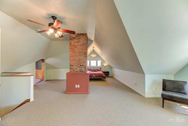 carpeted bedroom featuring vaulted ceiling and baseboards