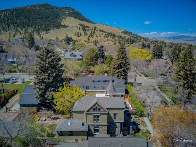 aerial overview of property's location with a mountainous background