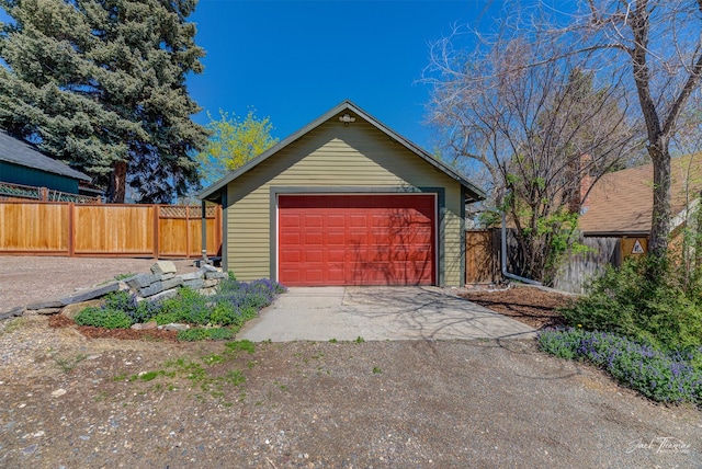 detached garage with fence