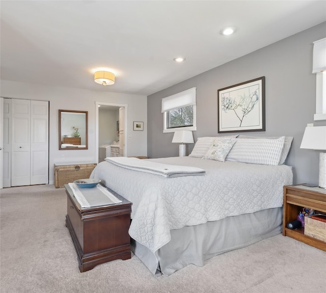 bedroom featuring carpet, a closet, recessed lighting, and connected bathroom