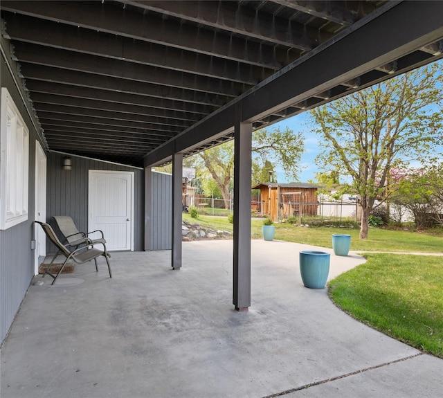 view of patio featuring an outdoor structure