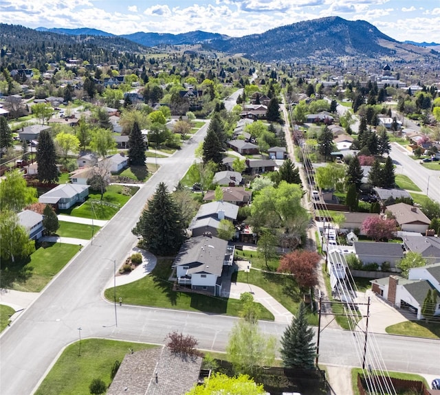 aerial perspective of suburban area with a mountainous background