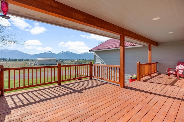 999 Websters Way, Stevensville, MT 59870 - wooden deck featuring a mountain view