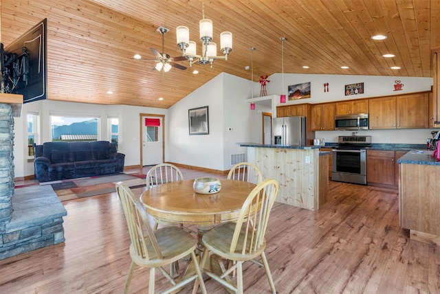 999 Websters Way, Stevensville, MT 59870 - dining area featuring wood ceiling, high vaulted ceiling, recessed lighting, light wood-type flooring, and baseboards