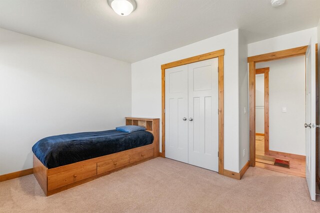 999 Websters Way, Stevensville, MT 59870 - carpeted bedroom featuring baseboards and a closet