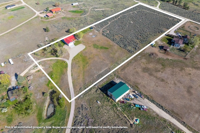 999 Websters Way, Stevensville, MT 59870 - aerial view of sparsely populated area featuring property boundaries highlighted