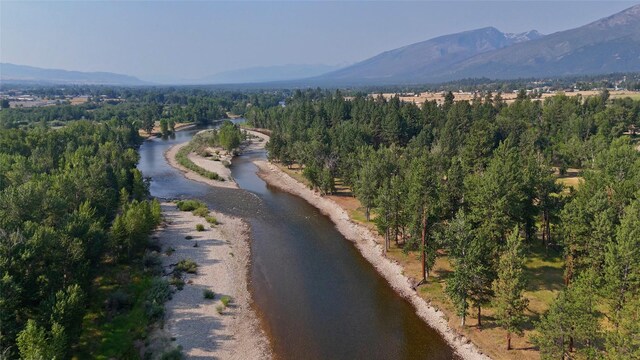 411 W River Rd, Hamilton, MT 59840 - aerial overview of property's location with a mountainous background