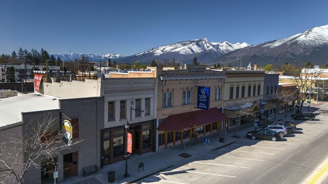 411 W River Rd, Hamilton, MT 59840 - view of property with uncovered parking and a mountain view