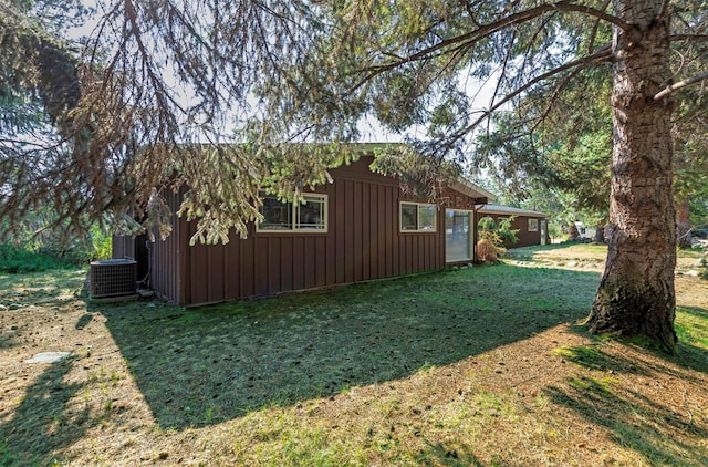 411 W River Rd, Hamilton, MT 59840 - view of green lawn with central air condition unit
