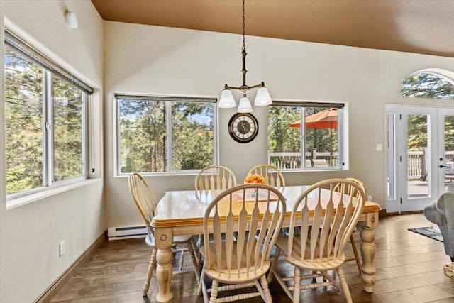 141 Aspen Ln, Eureka, MT 59917 - dining room featuring hardwood / wood-style floors and a baseboard radiator