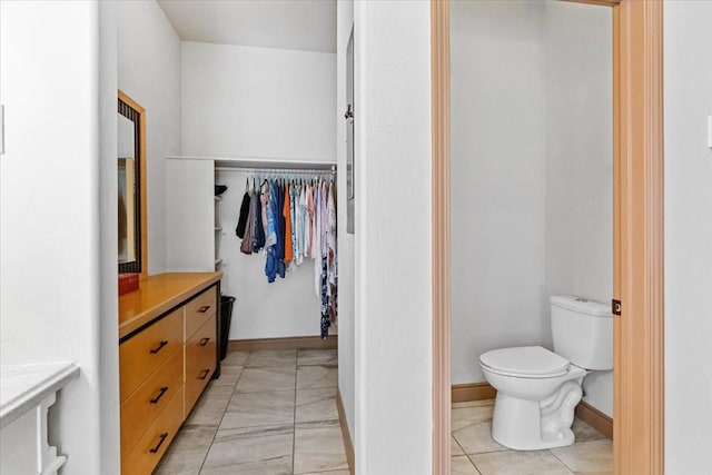 141 Aspen Ln, Eureka, MT 59917 - bathroom featuring vanity and a walk in closet