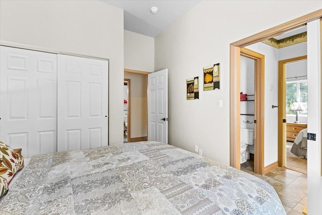141 Aspen Ln, Eureka, MT 59917 - bedroom with a closet and light tile patterned floors