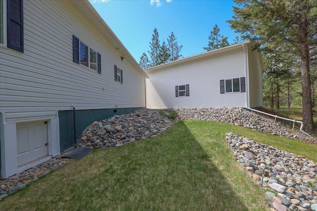 141 Aspen Ln, Eureka, MT 59917 - view of side of home featuring a yard