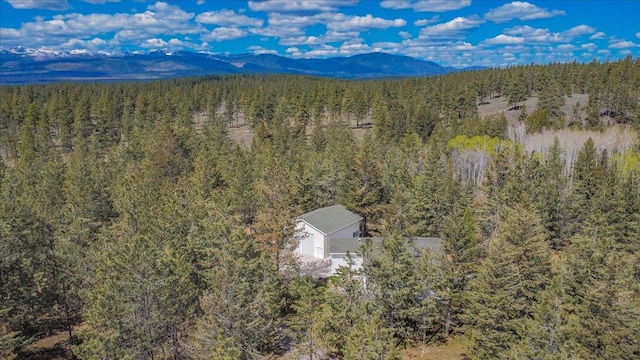 141 Aspen Ln, Eureka, MT 59917 - aerial view of property and surrounding area with a forest and mountains