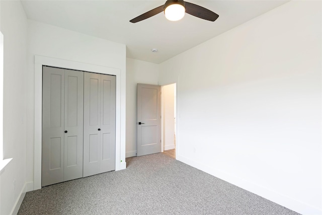 NHNLOT1 England Blvd, Missoula, MT 59808 - unfurnished bedroom featuring a closet, a ceiling fan, and carpet