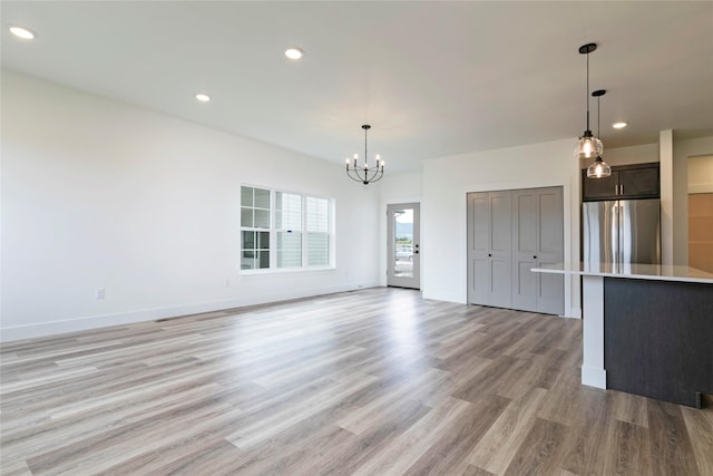 NHNLOT1 England Blvd, Missoula, MT 59808 - unfurnished dining area featuring a chandelier, light wood-type flooring, and recessed lighting