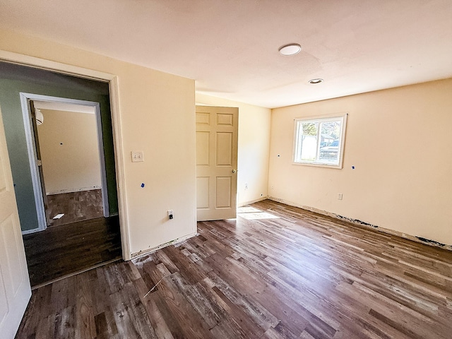 485 Wilson Butte Rd, Great Falls, MT 59405 - unfurnished bedroom with dark wood-style floors