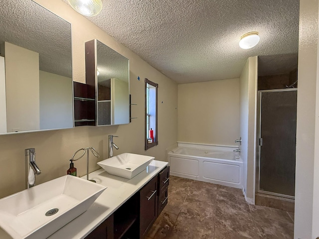 485 Wilson Butte Rd, Great Falls, MT 59405 - full bath with a shower stall, a bath, a textured ceiling, and double vanity
