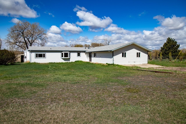 485 Wilson Butte Rd, Great Falls, MT 59405 - back of property featuring a yard