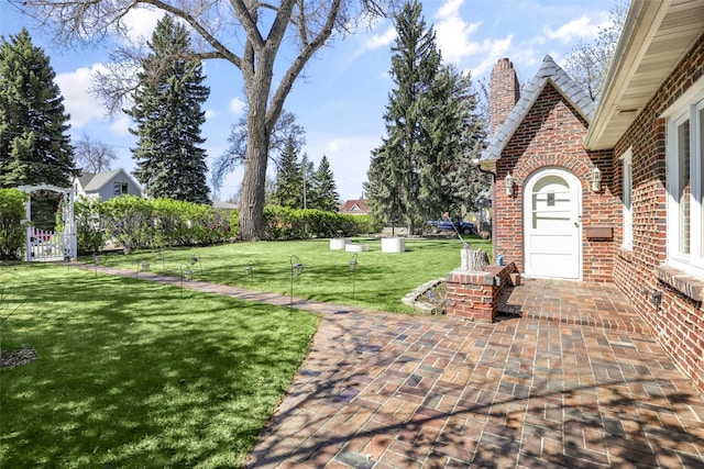 3313 5th Ave N, Great Falls, MT 59401 - view of green lawn featuring a patio area