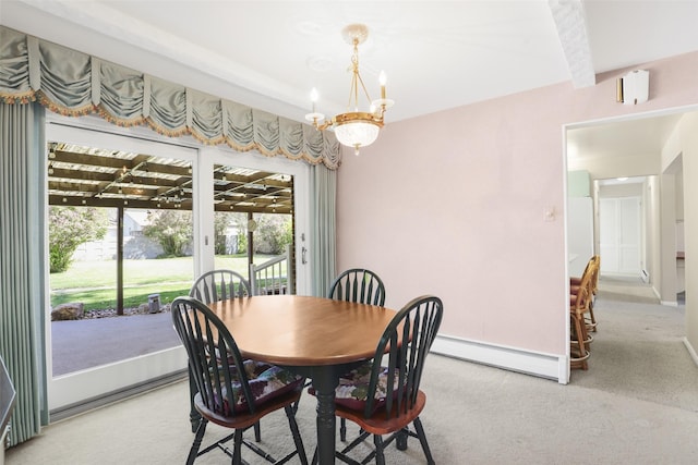 3313 5th Ave N, Great Falls, MT 59401 - carpeted dining space with a baseboard radiator, a chandelier, and baseboards