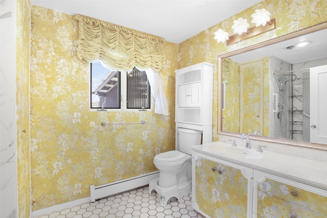 3313 5th Ave N, Great Falls, MT 59401 - bathroom featuring baseboard heating, toilet, wallpapered walls, a shower stall, and baseboards