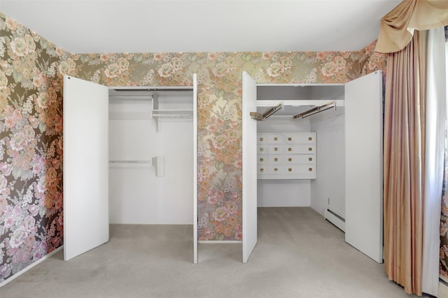3313 5th Ave N, Great Falls, MT 59401 - unfurnished bedroom with wallpapered walls, light colored carpet, a baseboard heating unit, and a closet