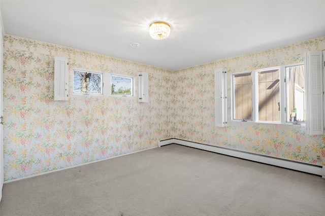 3313 5th Ave N, Great Falls, MT 59401 - spare room with carpet floors and a baseboard heating unit