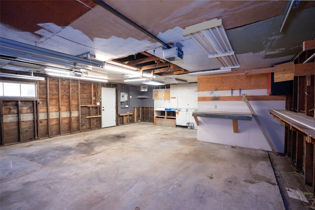 1221 7th Ave, Havre, MT 59501 - garage featuring a workshop area, a garage door opener, and electric panel
