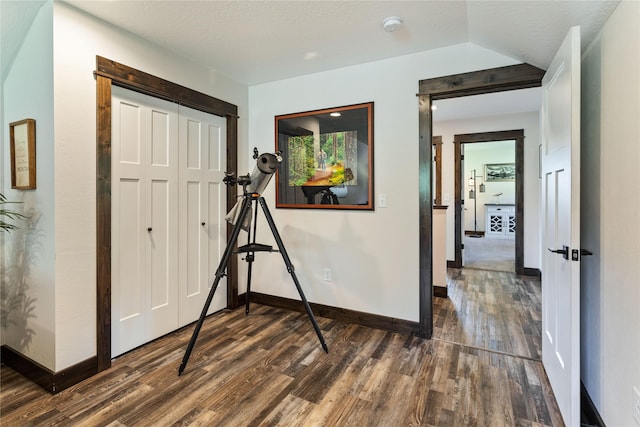 21087 Pamin Loop, Clinton, MT 59825 - hallway featuring dark wood-style flooring and baseboards