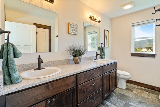 21087 Pamin Loop, Clinton, MT 59825 - bathroom with double vanity, stone finish flooring, and healthy amount of natural light