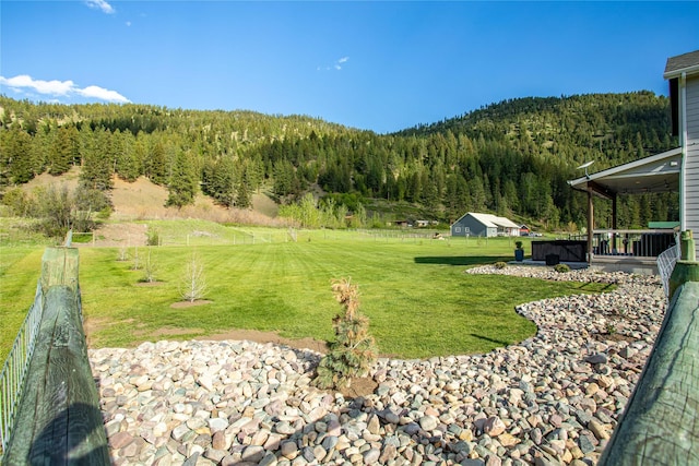 21087 Pamin Loop, Clinton, MT 59825 - view of grassy yard with a view of trees and a mountain view